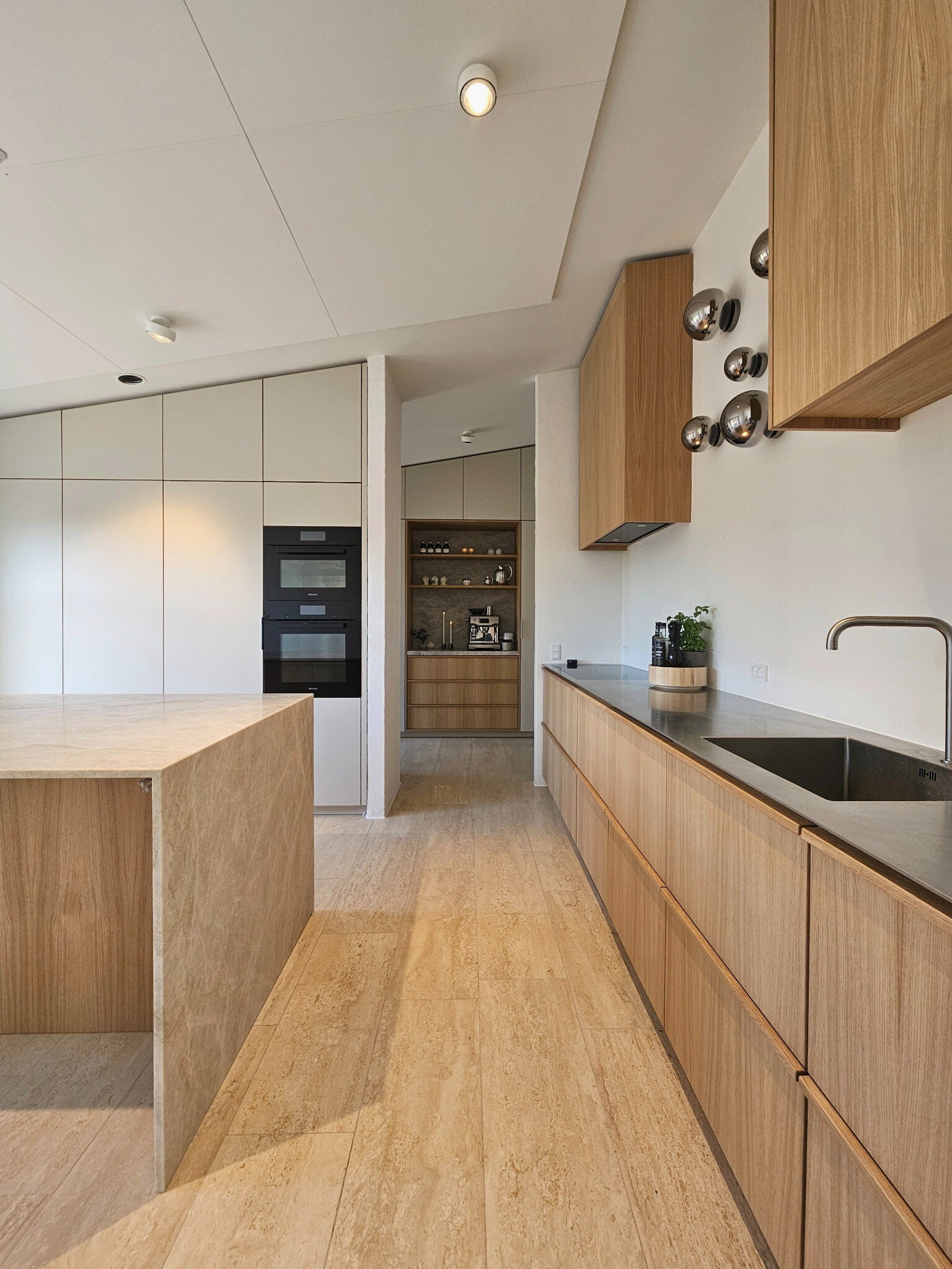 Bespoke kitchen in oak and natural stone